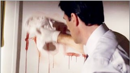 Hotch washes Elle's blood